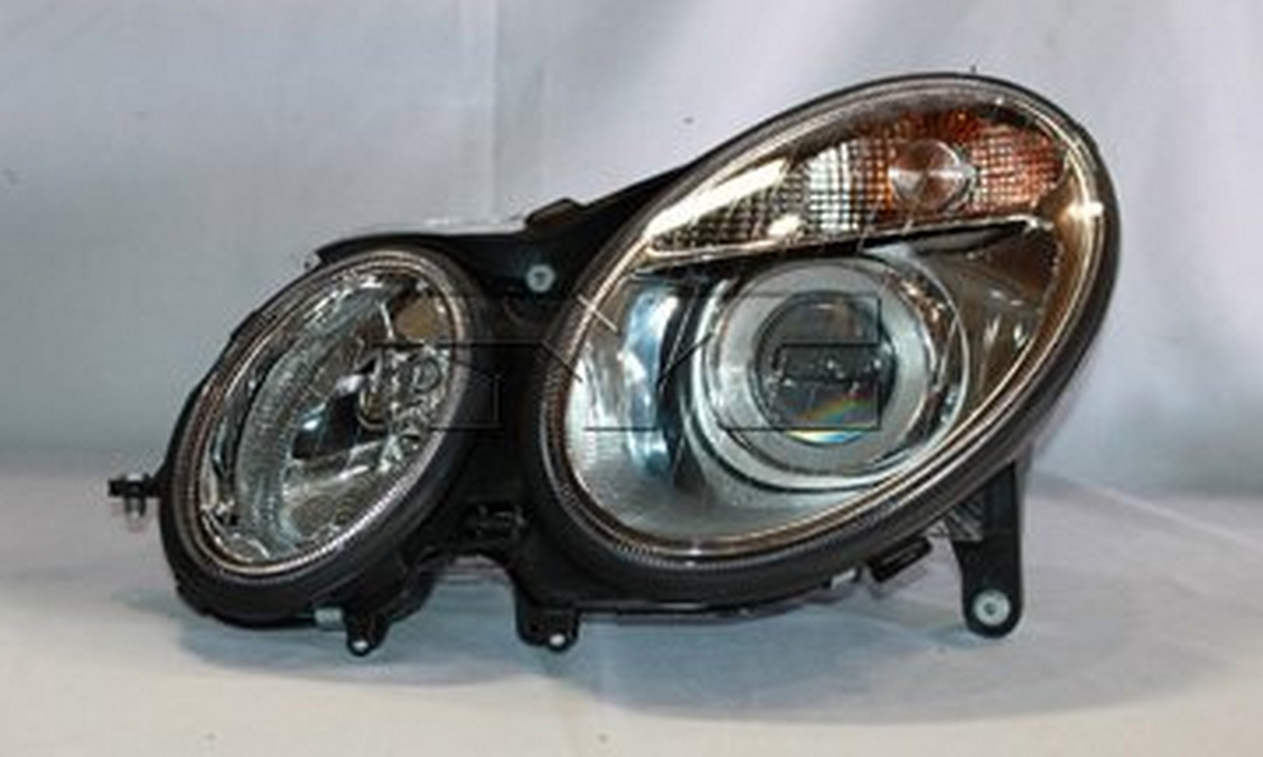 TYC 20-6486-00 - Headlight Assembly (Left)
