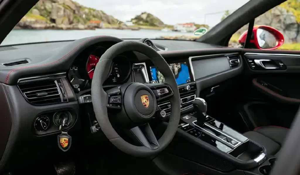 porsche macan interior view with mountain background