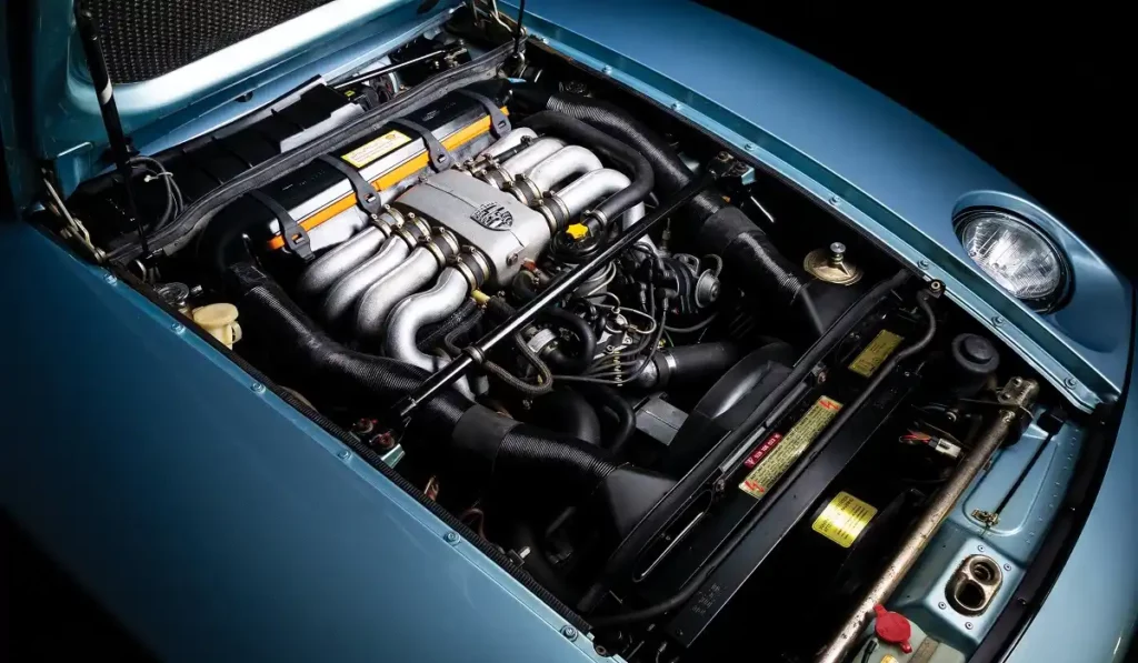 blue porsche 928 engine compartment view